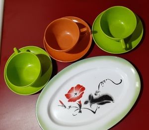 Enamelware platter and 3 color flyte cups and saucers